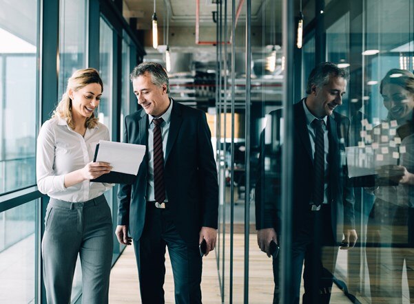 A secretary assisting her colleague